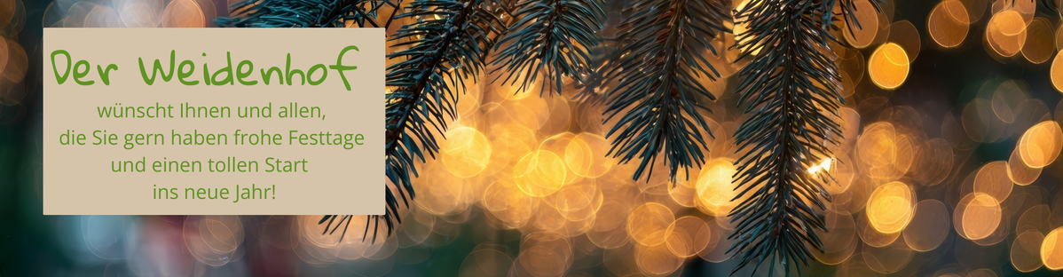 Weihnachtsgrüße mit Tannenzweigen und Lichtern: "Der Weidenhof wünscht frohe Festtage und tollen Start ins neue Jahr!"